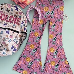 Cowgirl print bell bottoms